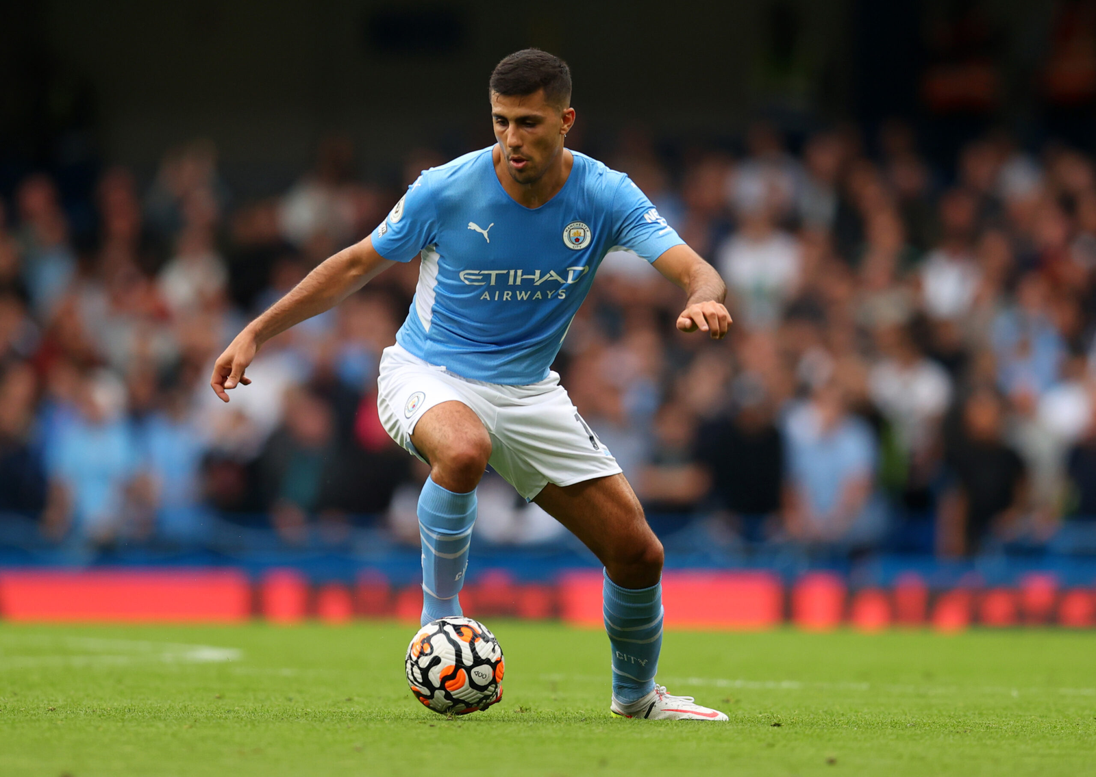 Rodri at the center of the pitch.
